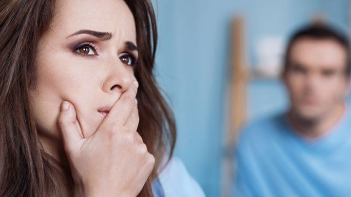 Woman upset with a man in the distance